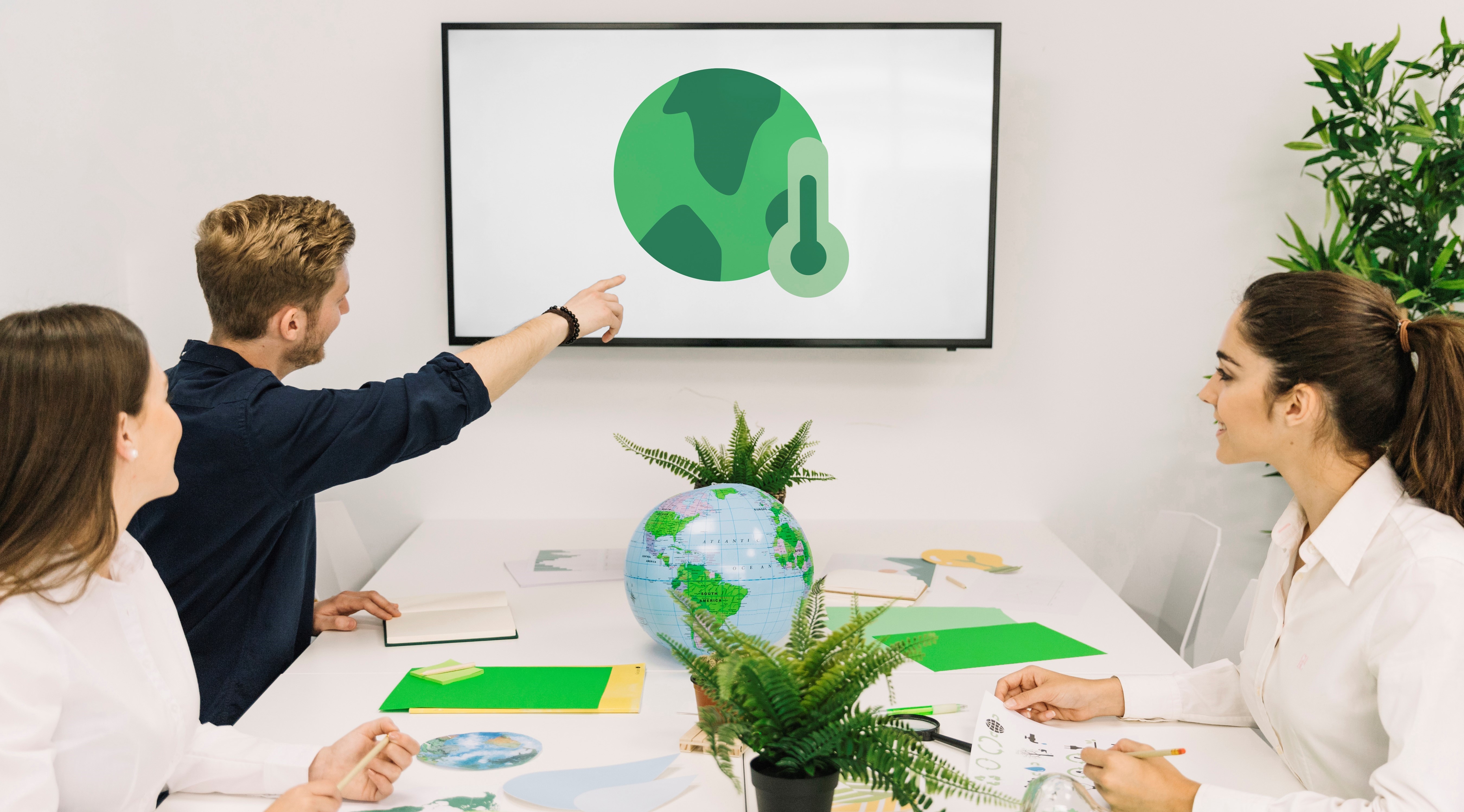 businessman-showing-global-warming-icon-his-colleagues-screen